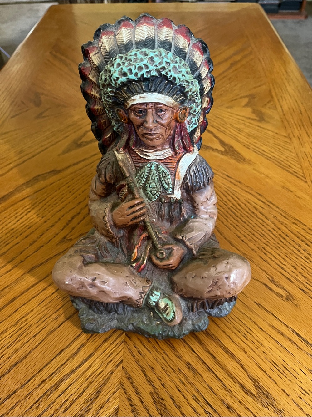 Universal statuary of sitting Indian chief